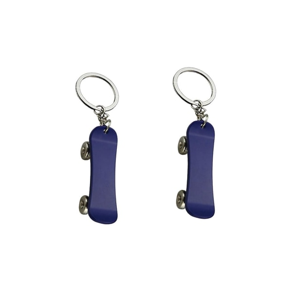 2kpl Rullalaudan muotoinen avaimenperä Luova avaimenperä avaimenperäsormus koristeeksi lahjaksi riippuva koriste autolaukkuun (hopea) Blue
