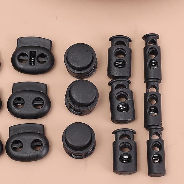 20 stk svarte plastfjær-snorlåsstopper-vippeknapper 4#: 2.5*1cm