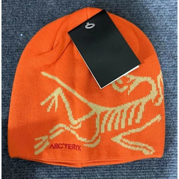 ARC'TERYX Vinterlue for menn, avslappet varm skihue, myk termisk strikket lue for kaldt vær, oransje orange color