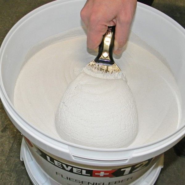 Kakellim Färdigt att använda Dispersionslim RM12 - 20KG + triangulärt tandad spatel