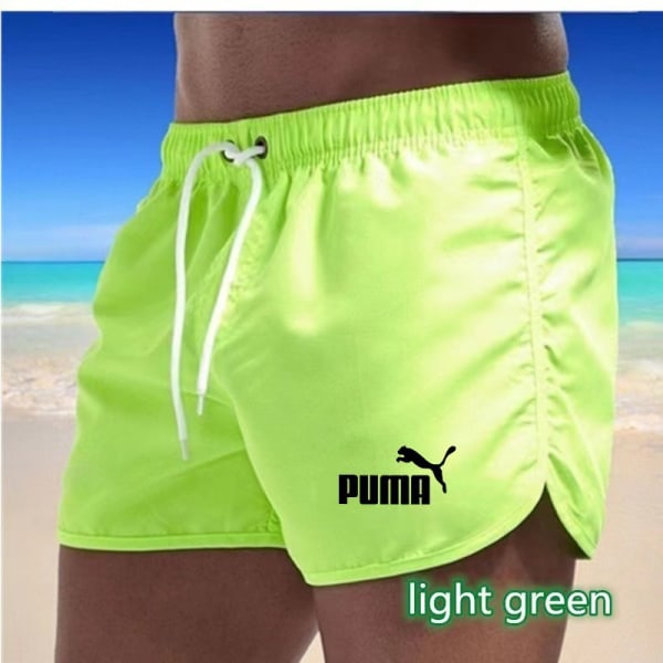 Flerfärgade sportshorts i strandpolyester med tre punkts puma Light green 2XL