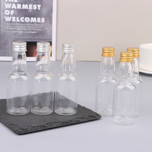 10 st 50 ml klara PET återfyllningsbara små vinflaskor med läckagesäker Silver