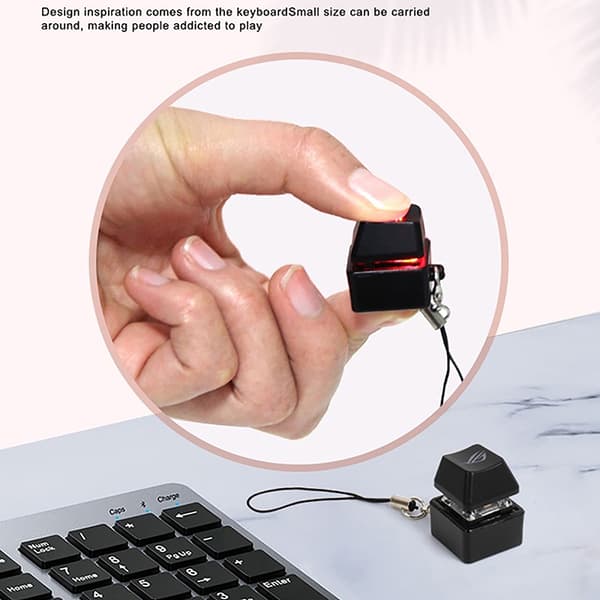 Merit +1 Muyu dekompressionsnyckelring Halsband LED Button Pendan Black one size