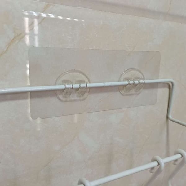 Seinälle kiinnitettävä liimakoukku lankahyllyn ripustimen alla Transparent 15*6*6CM