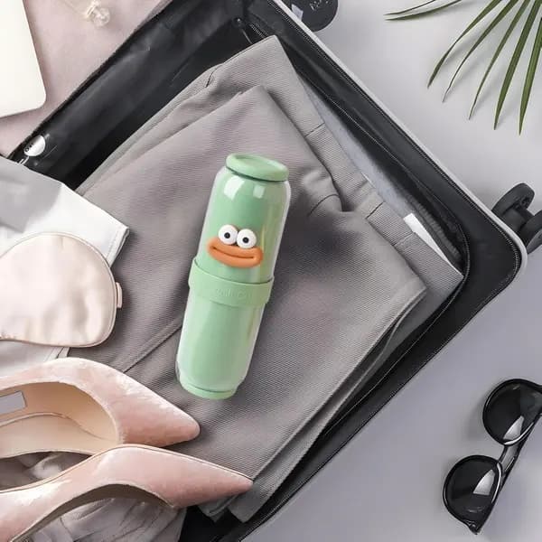 Resemugg, söt handduksformad behållare (grön).