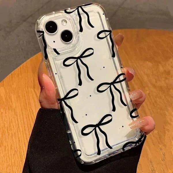 Sött svart hjärtformat rosettfodral för iPhone14plus, stötsäkert mjukt transparent fodral.