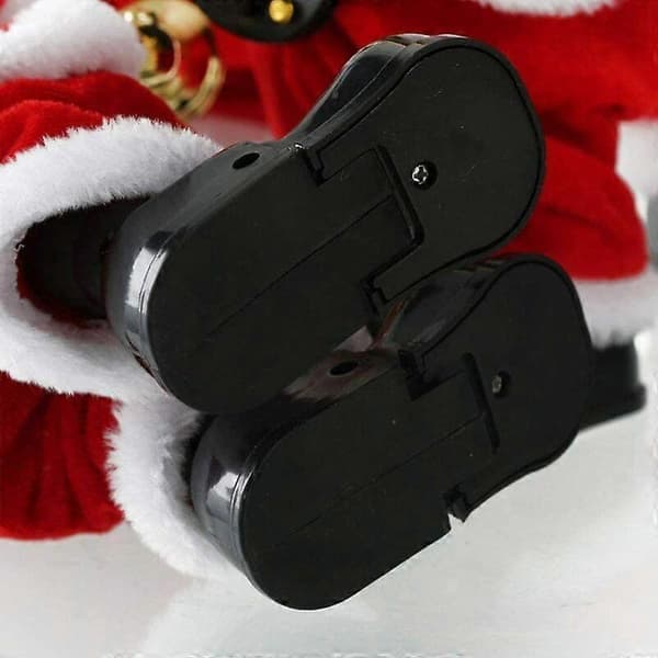 Batteridriven sjungande och dansande jultomte i plysch (batterier ingår ej)