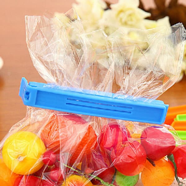 Pakke med 20 poseklemmer. 11. Tilfældig farve. Plastik.