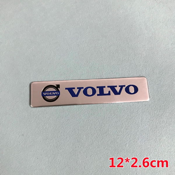 (VOLVO parallellogram + VOLVO lang A) to Volvo-logoer Grillgrill