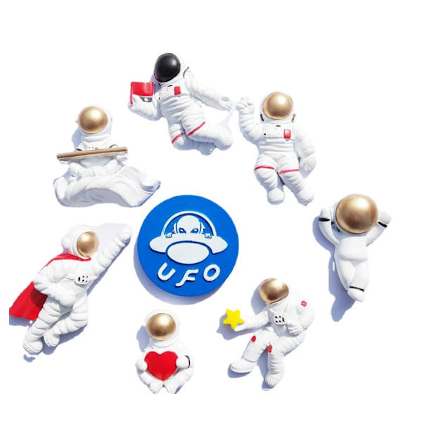 (Astronautti lippu kädessä - Kulta) 2 kpl, koristeellinen jääkaappimagneetti