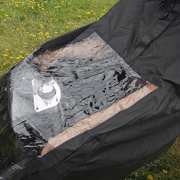 Universal vind- og vanntett heldekkende rullestolponcho med hette