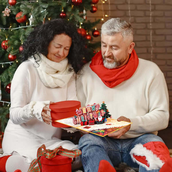 Pop Up julkort – tomte, julgran och presenter – 3D Merry