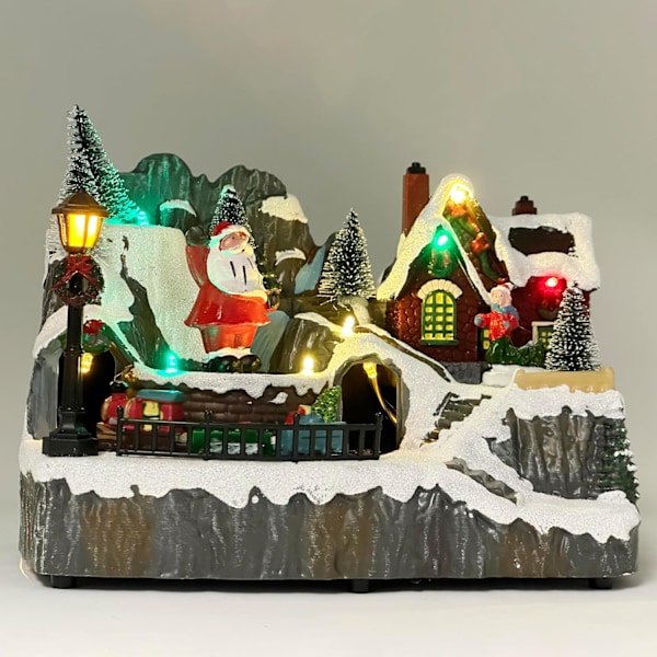 Harpiks Julelandsby Hus med Tog, Julehus Samlefigur med LED Lys (Julemanden) C