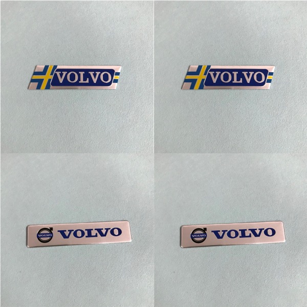 (VOLVO parallellogram + VOLVO long A) två Volvo-logotyper Grillgrill