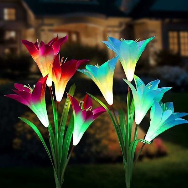Udendørs Solcelledrevne Havelys 8 Multifarvede Lily Blomster Skiftende LED Solcelledrevne Lys på Pæl Have Terrasse Have (Blå og Lilla) RWElighting og lig