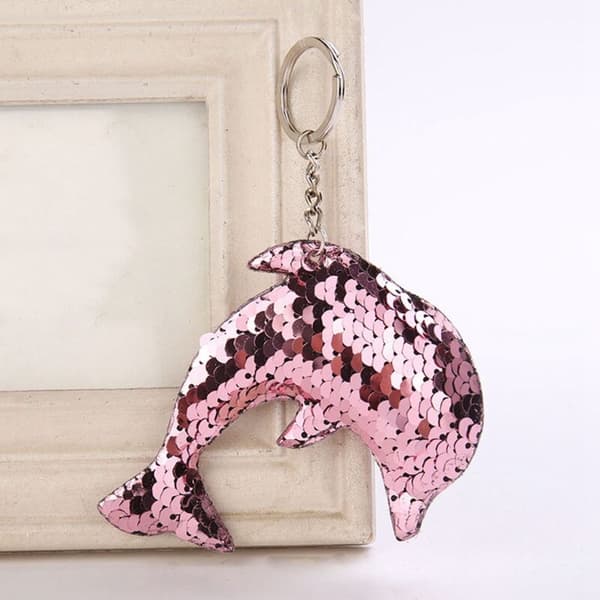 Glittrande rosa nyckelring med delfin för flickor