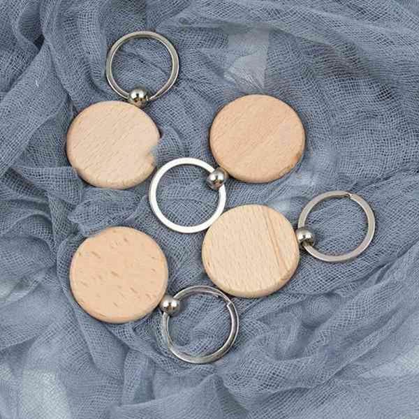 50 kpl sarjaa tyhjiä pyöreitä puisia avaimenperiä DIY puiset avaimenperät Avaimenperät voidaan kaivertaa DIY-lahjoja