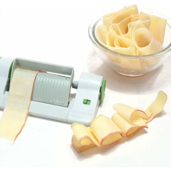 Veggie Sheet Slicer, den innovativa redskapet för att skära grönsaker och frukter i extra tunna strimlor – denna skalare är en oumbärlig kulinarisk assistent
