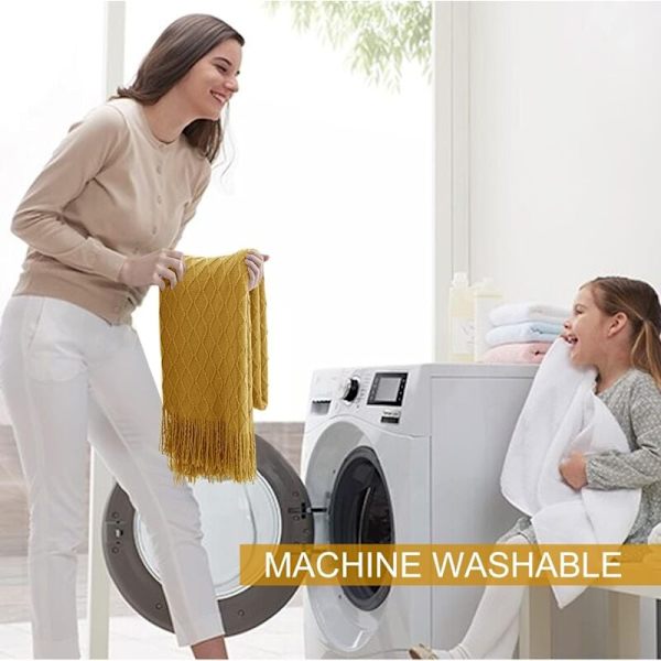 Strikket sofateppe med pomponer 127 x 180CM