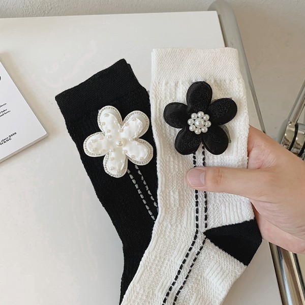 Dame uformelle blomstersokker vevde sokker høykvalitets svarte og hvite komfortable svetteabsorberende sokker