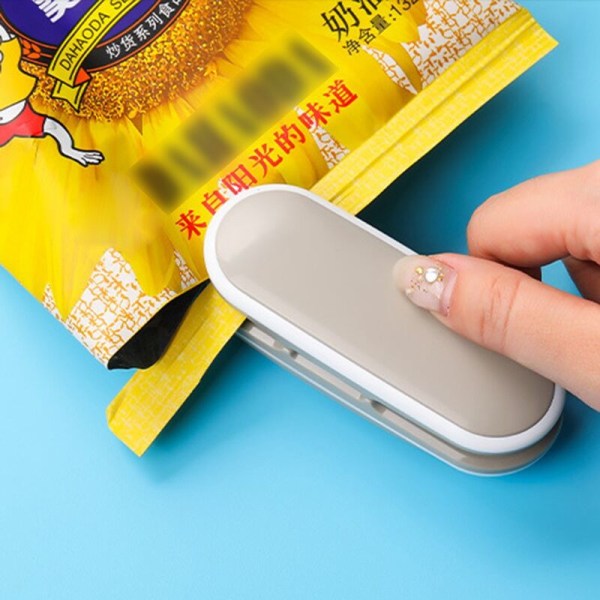 2 i 1 Mini Varmeforsegler til Poser og Grøntsagsskærer Batteri Snackpose Dispenser Forseglingssektion Grå