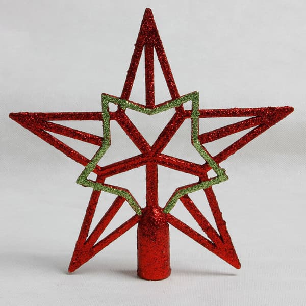 Julgransdekoration med rött glitteremblem