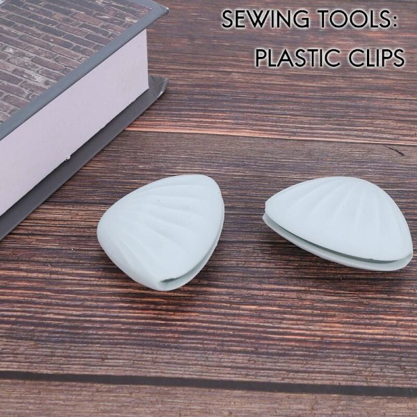 4 stk/sett stiftespenne Non-Slip Wonder dynetrekk ark klips 4-hjørners feste seng dyneholdere skallklips