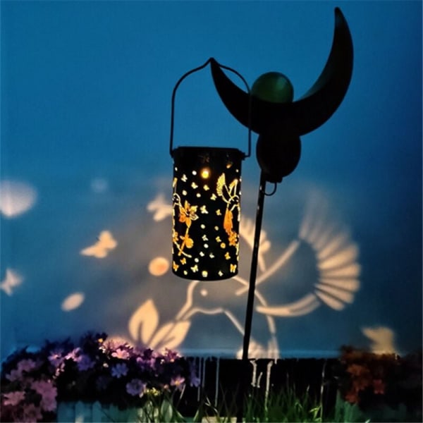 Fjärilsfågelprojektionslampa Smidesjärn ihålig trädgårdsgård Solcellslykta Kan sättas in Hängande lampa