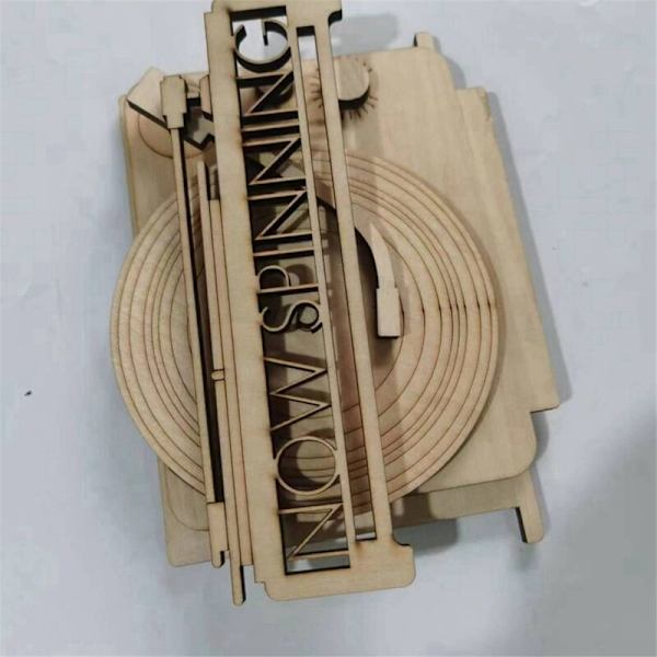 Nu snurrar multifunktionell albumhållare för barns musiksamling, träfärg
