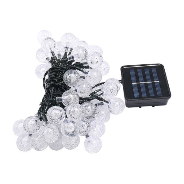 LED solgarland 30 bollar (6,50m) - mörkgrön tråd, svart batteri och solcellsladdning, transparent boll, varm vit-svart