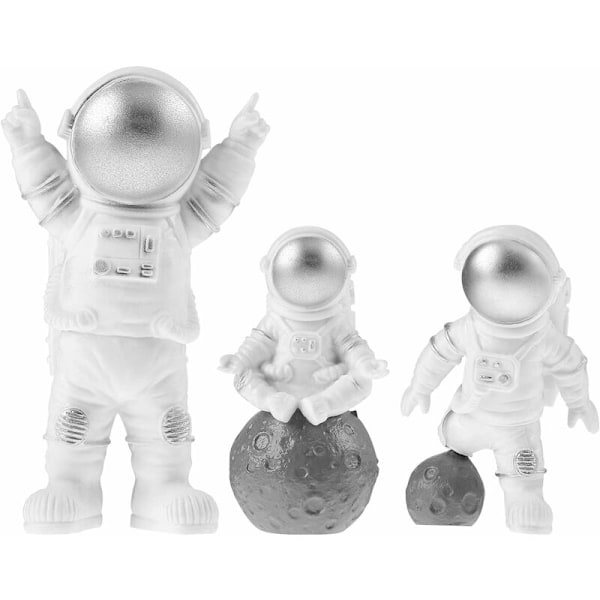 3 astronauttia PVC-kakkukoristetta