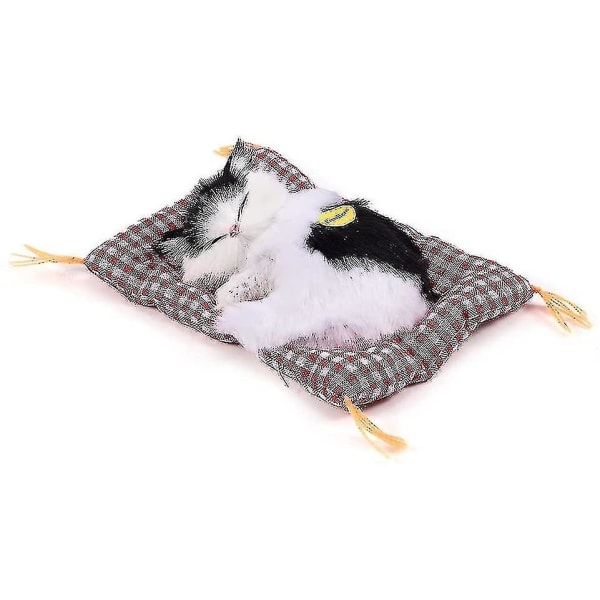 Simulaatiolelut nukkuvan kissanpennun pehmoleluilla. Lahja802