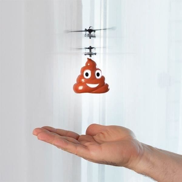 Helikopter i form av en bajs-emoji för att styra med handen
