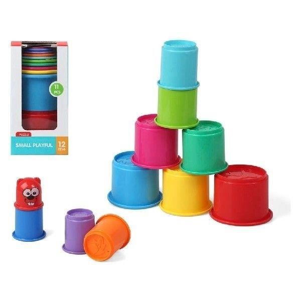 Färgade koppar för montessori byggspel