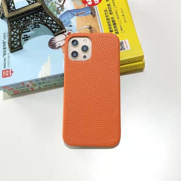 Deksel for iPhone 17AIR Oransje solid lær halvdeksel tekstur