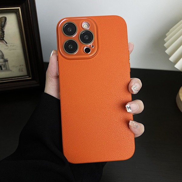 Etui til iPhone 15 koral orange lychee tekstur hudfølelse krystal fin pore hård