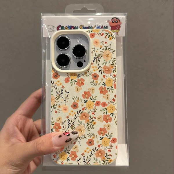 Fodral för iPhone16 små blommiga grenar litchimönster Athena vit klar läder medium