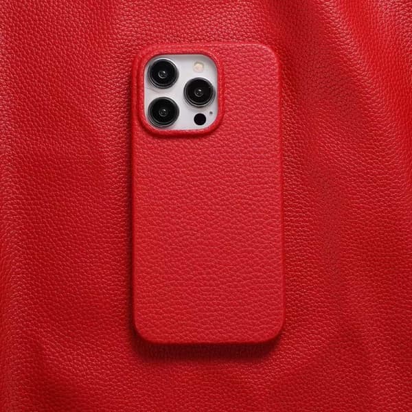 Etui til iPhone 16 lychee mønster rødt skinnmønster enkelt solid hardt fallsikkert