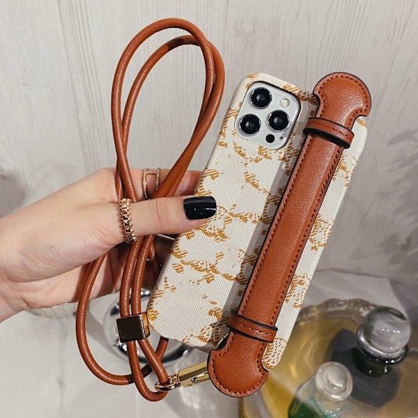 Etui til iPhone 14pro hvid blomst snor trendy mærke internet berømthed læder vibrato håndledsrem