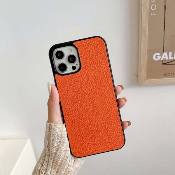 Skal för iPhone 14 Pro orange lychee läder retro mönster