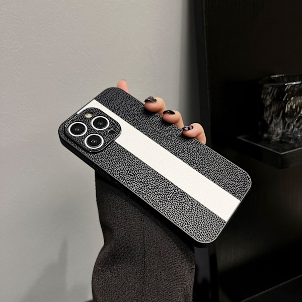 Etui til iPhone 14 Pro Max, sort og hvidt matchende lammeskind, kreativt læder