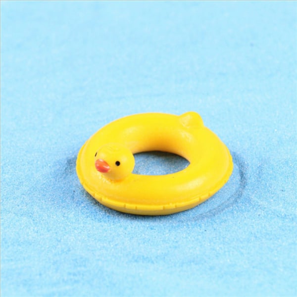 Miniatyrmøbler Leketøy Dukker Hus DIY dekorasjon Tilbehør Mini Duck Head Svømmering 1:12 Swimming ring