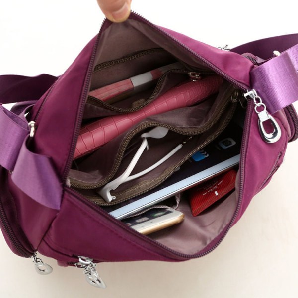 Kesäinen Oxford Cloth -monikerroksinen käytännöllinen Crossbody-laukku Yksinkertainen painatusreppu Purple