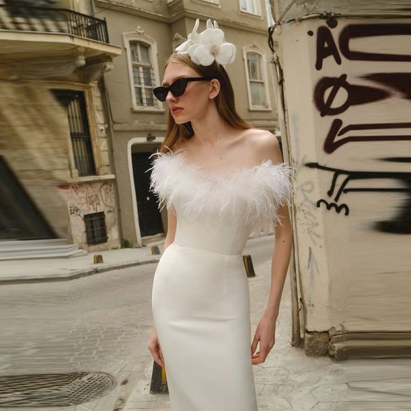 Aftenkjole Elegant strutsfjærbandasje strikket kjole White XS
