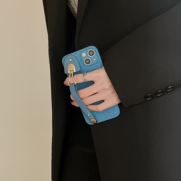 Deksel til iPhone 14PLUS Månegropmønster lyseblå kaffebønne ding armbånd lær rock s