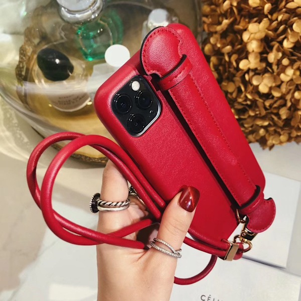 Etui til iPhone 14 rød lanyard trendy mærke internet berømthed læder vibrato armbånd