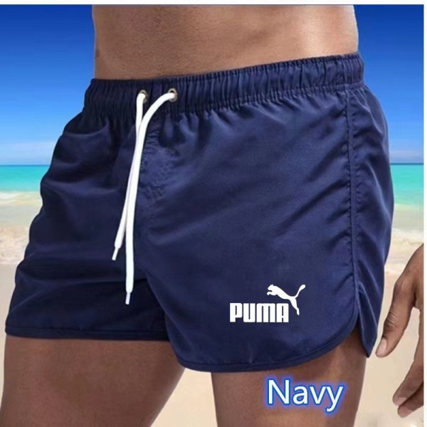 Flerfärgade sportshorts i strandpolyester med tre punkts puma Navy S