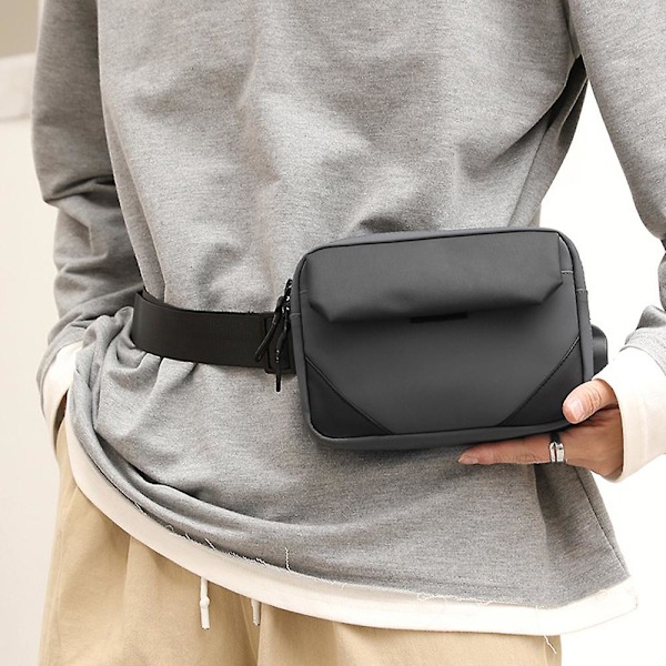 Ny trendig crossbody-väska för män i Oxford-tyg med enfärgad design.