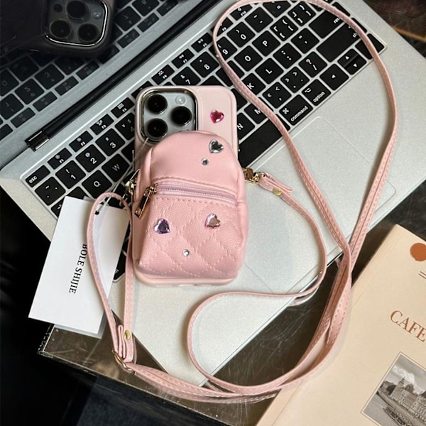 För iPhone 14 Pro TPU Skal Läder Liten Skolväska Design Mobilskal med Axelrem - Rosa