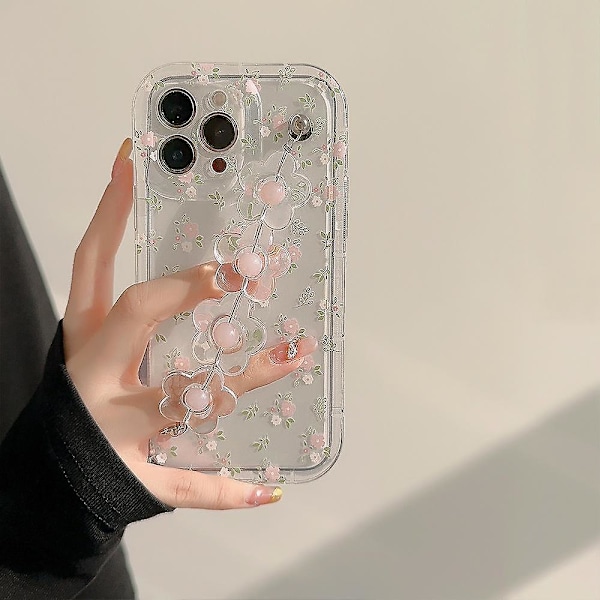 Läpinäkyvä kukka-aiheinen TPU-puhelinkotelo iPhone 13 Pro Max -puhelimelle, jossa kukkakoruketju